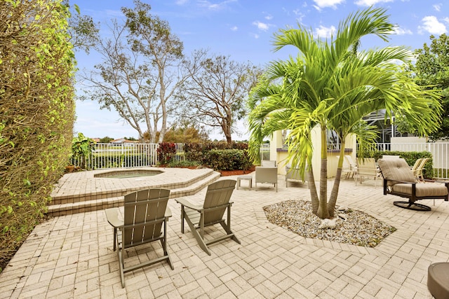 view of patio with an outdoor fire pit