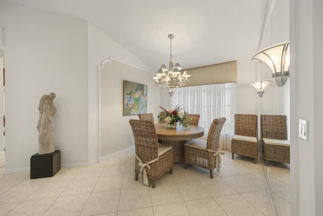 dining space featuring light tile patterned flooring, a notable chandelier, and lofted ceiling