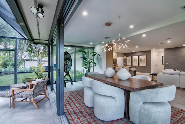 dining space with a wall of windows