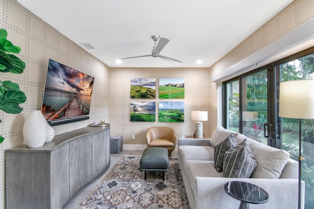 living room featuring ceiling fan