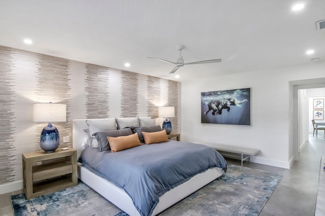 bedroom with concrete floors and ceiling fan