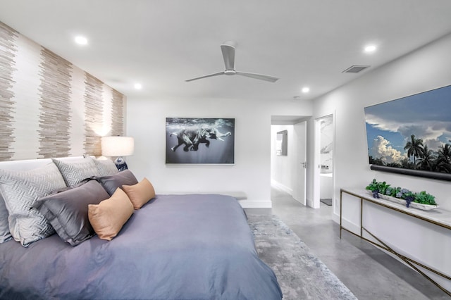 bedroom with ceiling fan and concrete floors