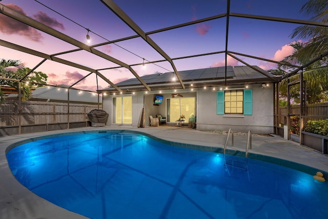 5280 SE Dell St, Stuart, FL 34997 - view of pool with a patio and glass enclosure