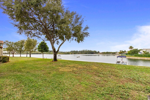 view of yard with a water view