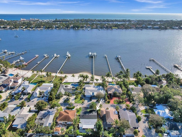 birds eye view of property featuring a water view