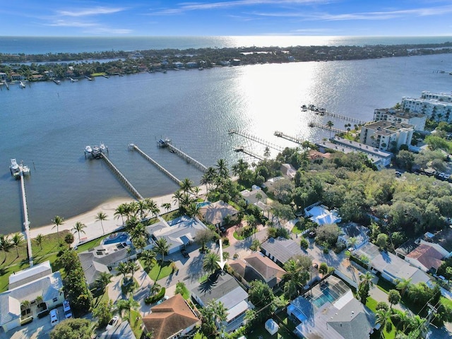 bird's eye view with a water view