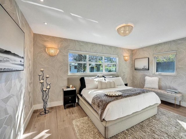 bedroom with light hardwood / wood-style flooring