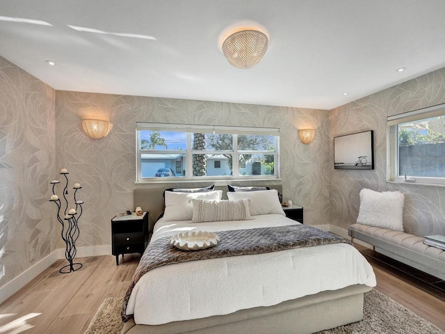 bedroom with light hardwood / wood-style floors