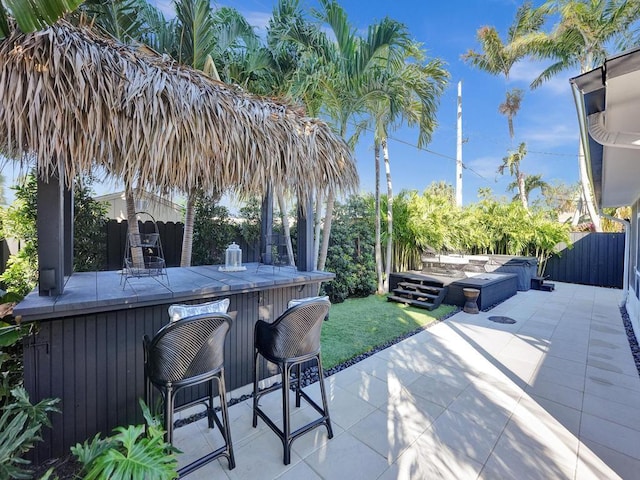 view of patio / terrace with an outdoor bar