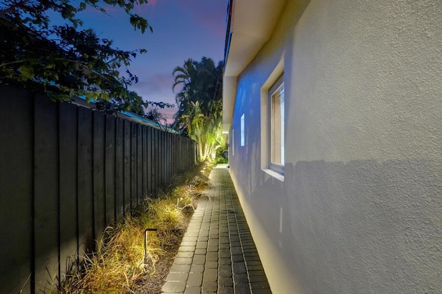 view of property exterior at dusk