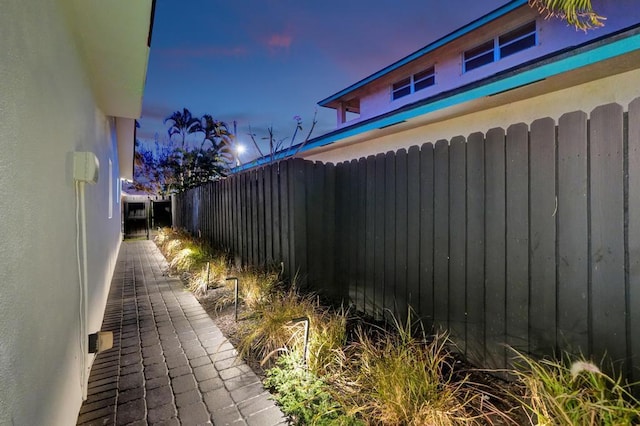 view of property exterior at dusk