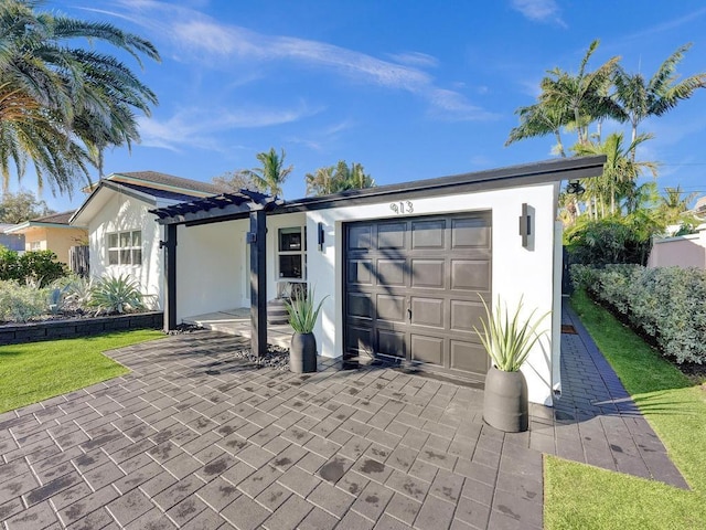 view of front of home with a garage