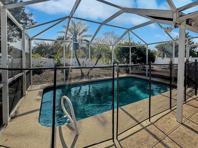 view of pool featuring a lanai