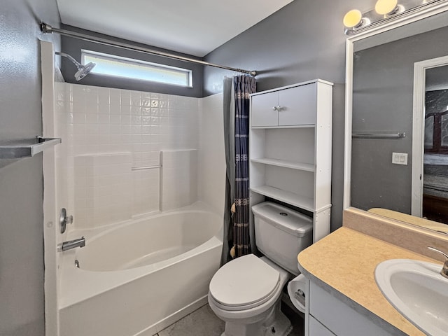 full bathroom featuring tile patterned floors, toilet, vanity, and shower / bath combination with curtain