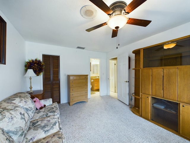 living room featuring ceiling fan and light carpet