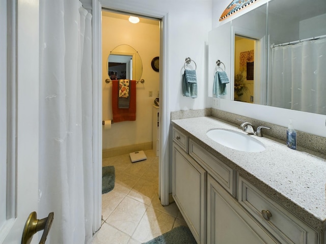 bathroom featuring tile patterned floors and vanity