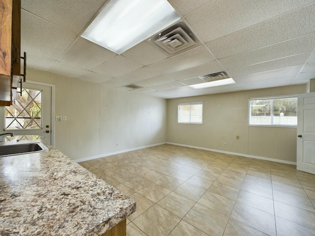 kitchen with sink and a paneled ceiling