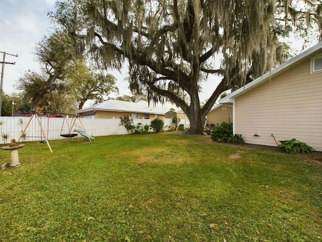 view of yard featuring a playground