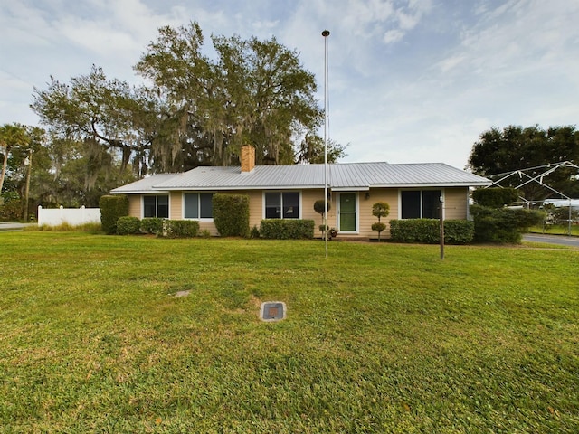 single story home with a front yard