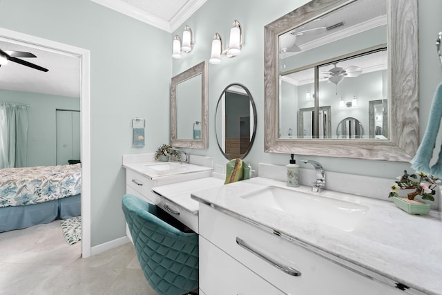 full bathroom with two vanities, a sink, a ceiling fan, and crown molding