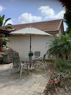 view of patio with outdoor dining space