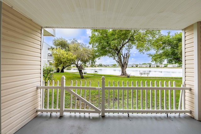 balcony featuring a water view