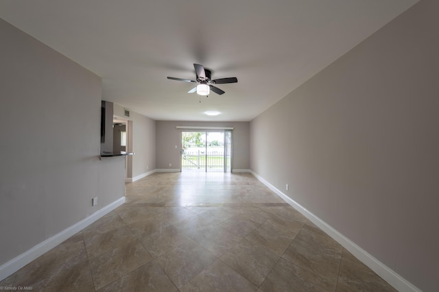 unfurnished room with ceiling fan