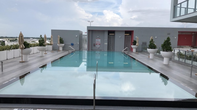 view of swimming pool featuring a patio