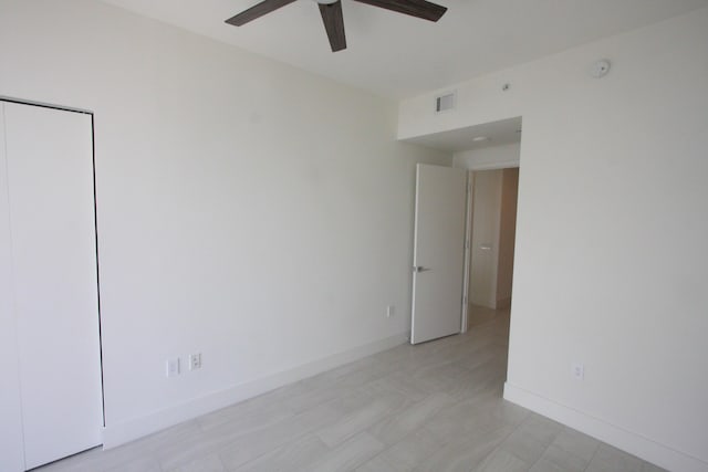 empty room with ceiling fan