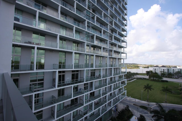 view of building exterior featuring a water view