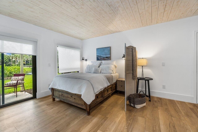 bedroom featuring wood ceiling, access to outside, and light wood-type flooring