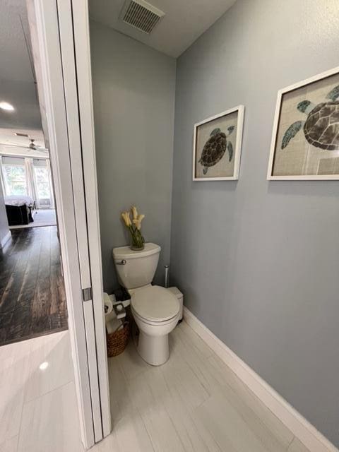 bathroom featuring toilet