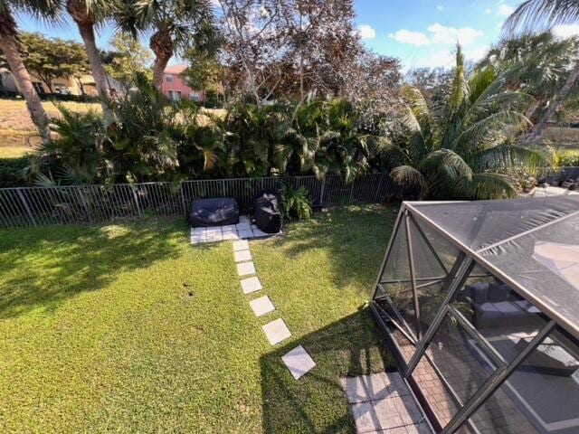 view of yard with a lanai