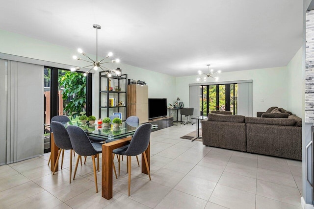 tiled dining room featuring an inviting chandelier