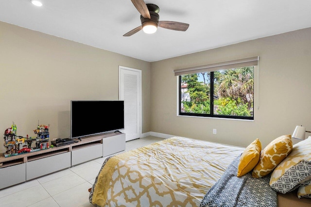 bedroom featuring ceiling fan and light tile patterned floors