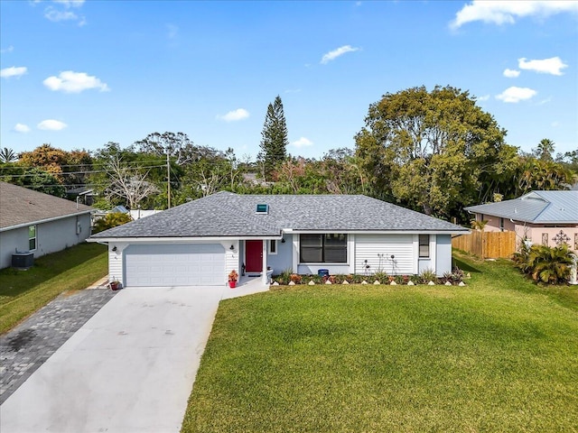 single story home with a garage, central air condition unit, and a front lawn