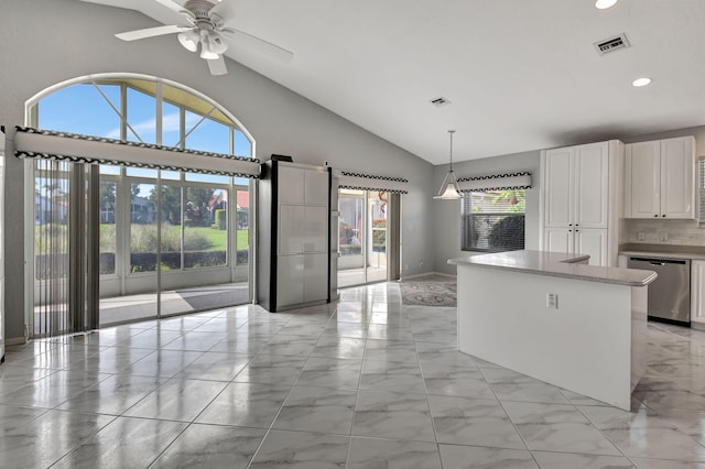 kitchen featuring visible vents, white cabinets, dishwasher, decorative light fixtures, and marble finish floor