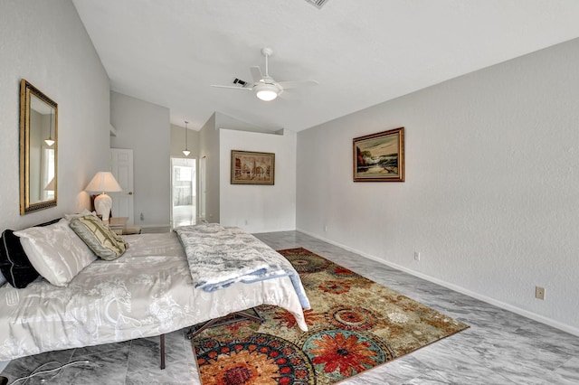 bedroom with vaulted ceiling, a ceiling fan, baseboards, and a textured wall