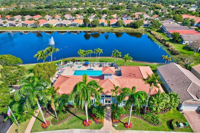 aerial view with a residential view and a water view