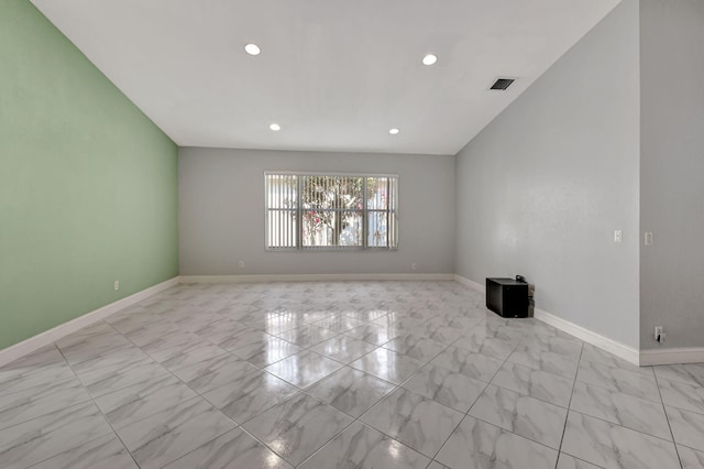 spare room featuring recessed lighting, baseboards, and visible vents