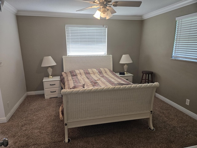 carpeted bedroom featuring crown molding and ceiling fan