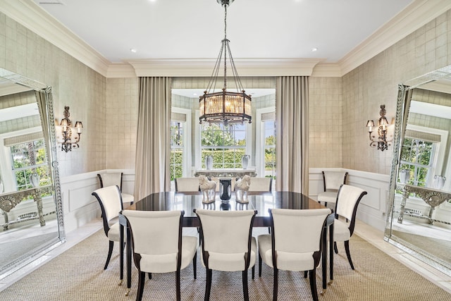 dining space featuring a notable chandelier and ornamental molding