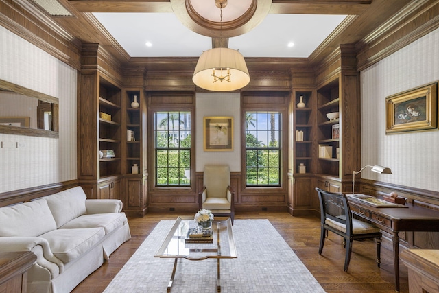 interior space featuring built in features, dark wood-type flooring, and ornamental molding