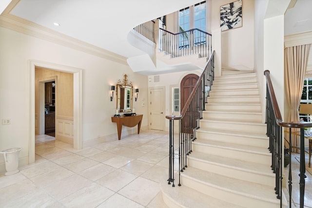 staircase with ornamental molding