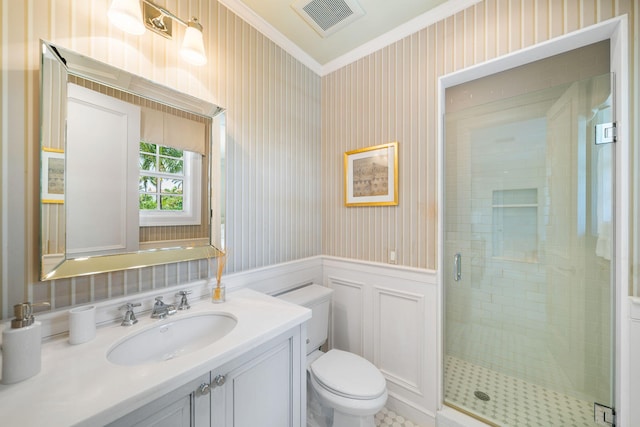 bathroom featuring vanity, walk in shower, ornamental molding, and toilet