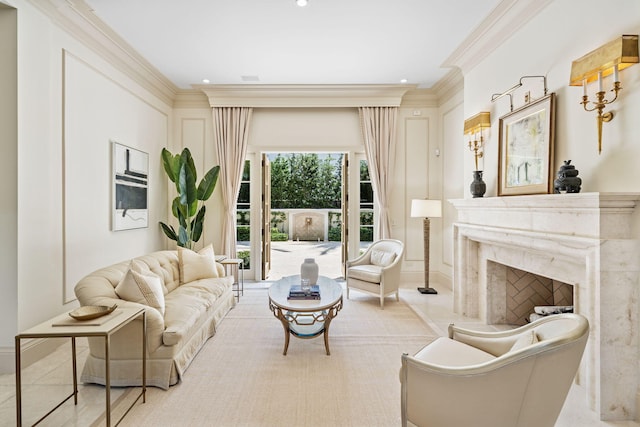 living room with a fireplace and ornamental molding