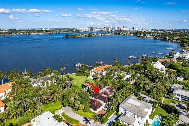 birds eye view of property featuring a water view