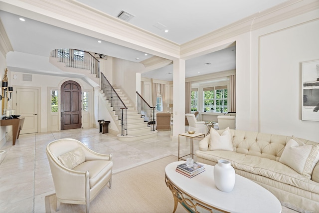 living room featuring crown molding