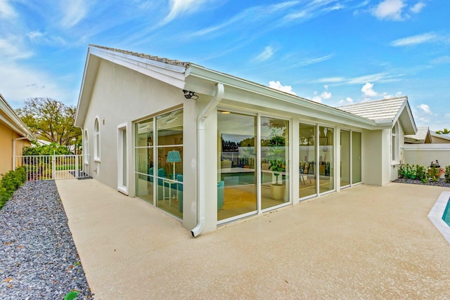 back of house featuring a patio area