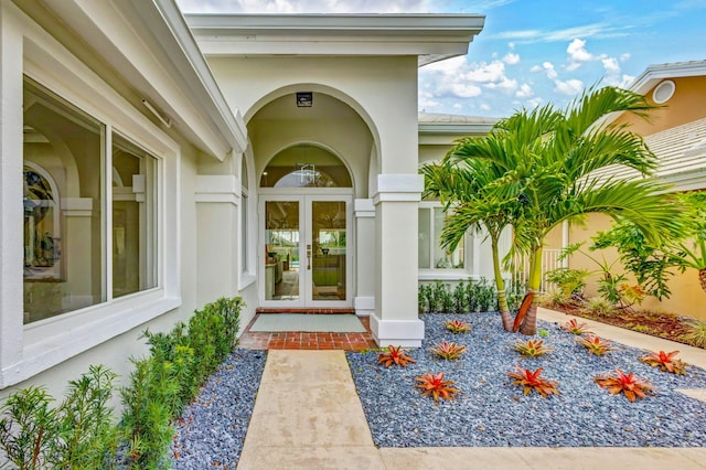 property entrance featuring french doors